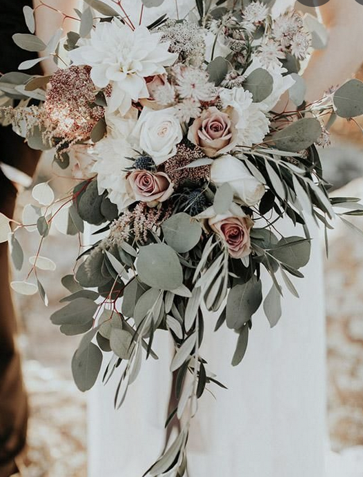 Wedding bouquet with sage green ivory and peach roses
