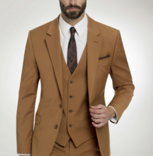 Three piece camel colored suit for fall is a beautiful choice and right in with 2022 wedding trends